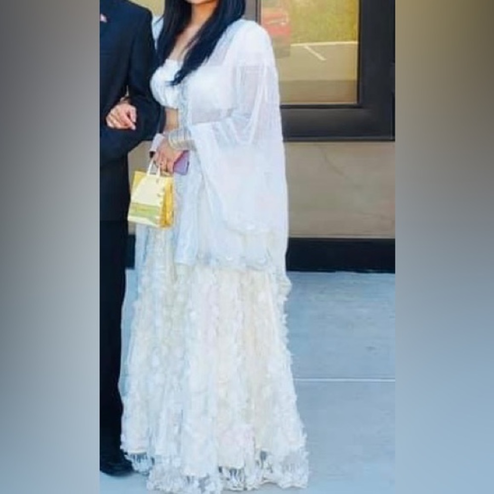 White 3D floral lehenga set.